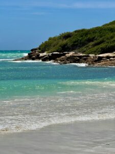 Relaxing view of Cabo Rojo's coastline with turquoise waters and rocky shoreline.