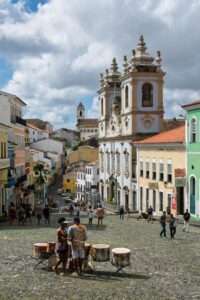 Explore the colorful and historic Pelourinho district in Salvador, Brazil, featuring colonial architecture and lively street scenes.